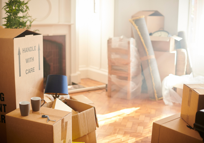 A packed room with natural lighting.