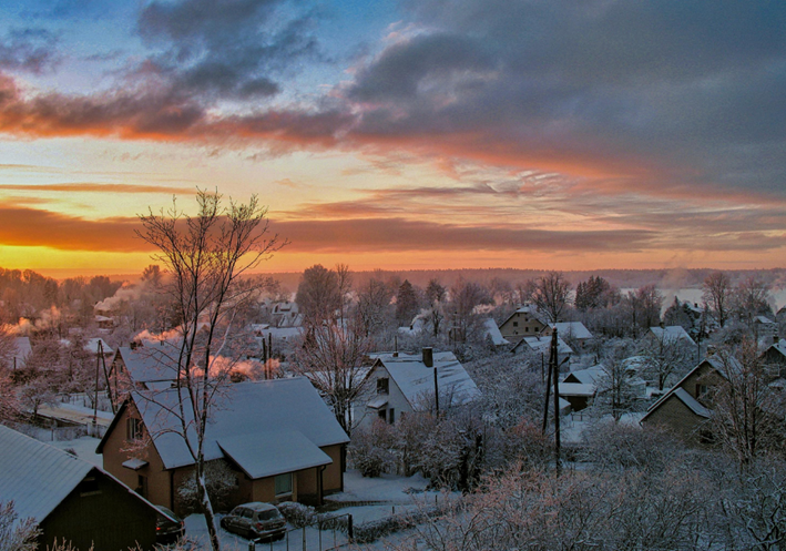 A snowy sunrise on a residential area